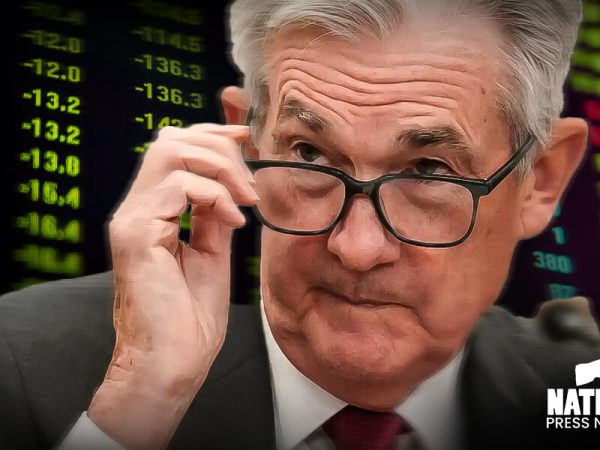 Stock futures slide to start week with more earnings and a powell speech ahead