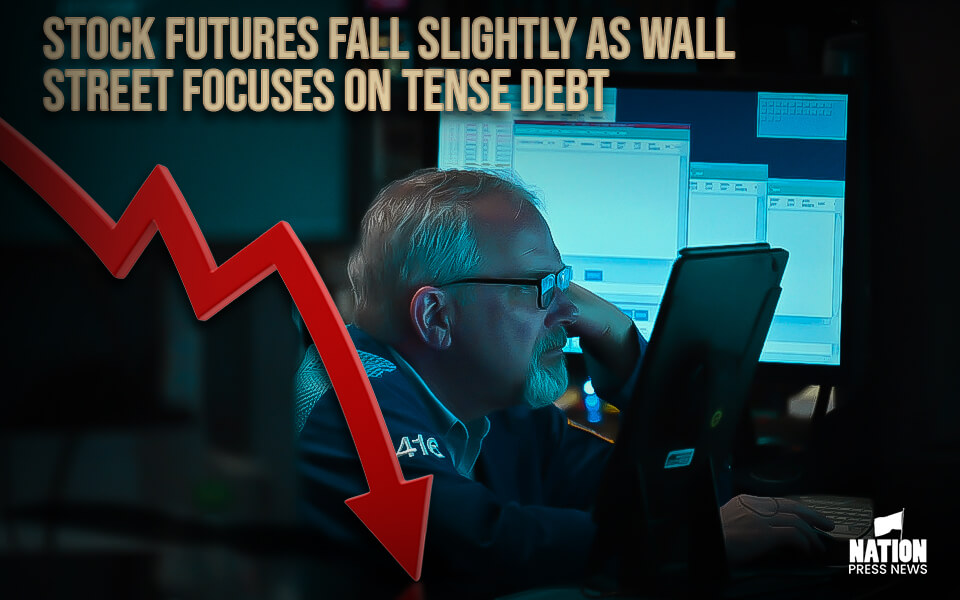 Stock futures fall slightly as Wall Street focuses on tense debt ceiling negotiations
