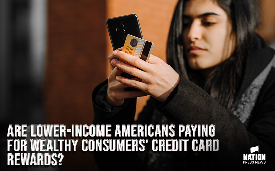 Are lower-income Americans paying for wealthy consumers’ credit card rewards? Some economists say they are